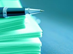 pen and paper stack