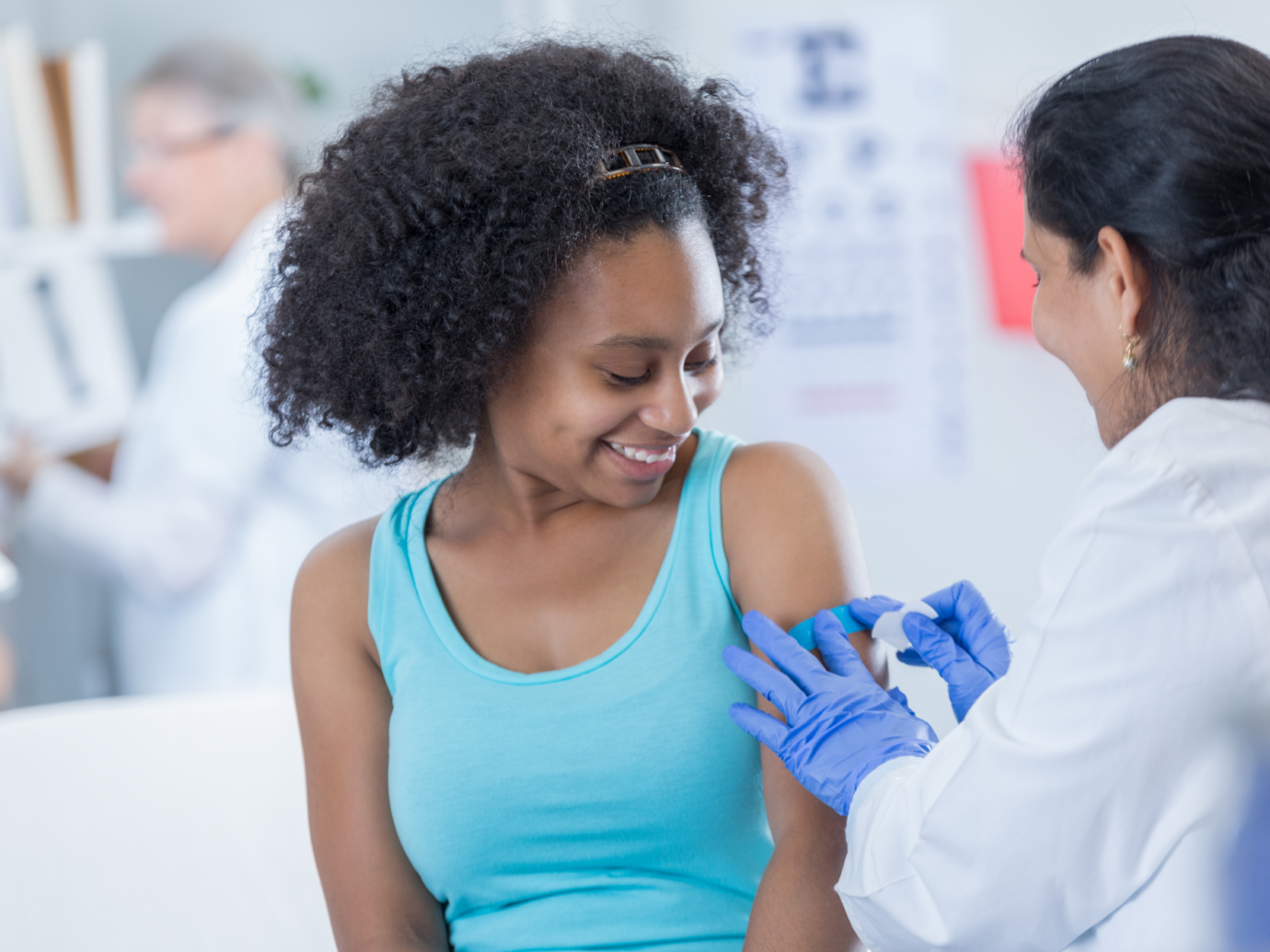 Woman receiving a vaccine