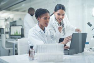 Coworkers reviewing lab data