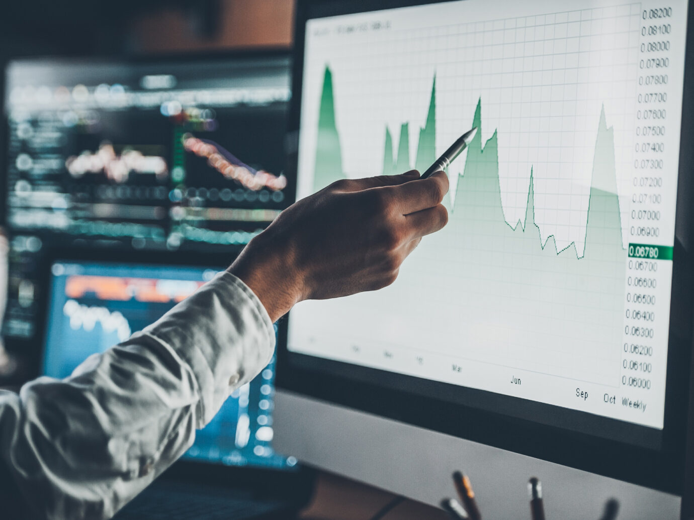 Man pointing at a graph