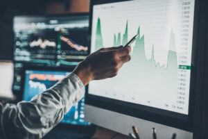 Man pointing at a graph